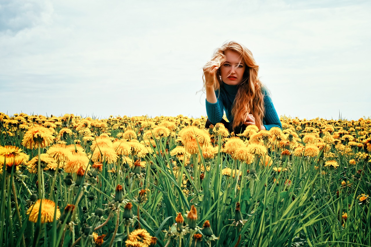 girl in field of dandelions