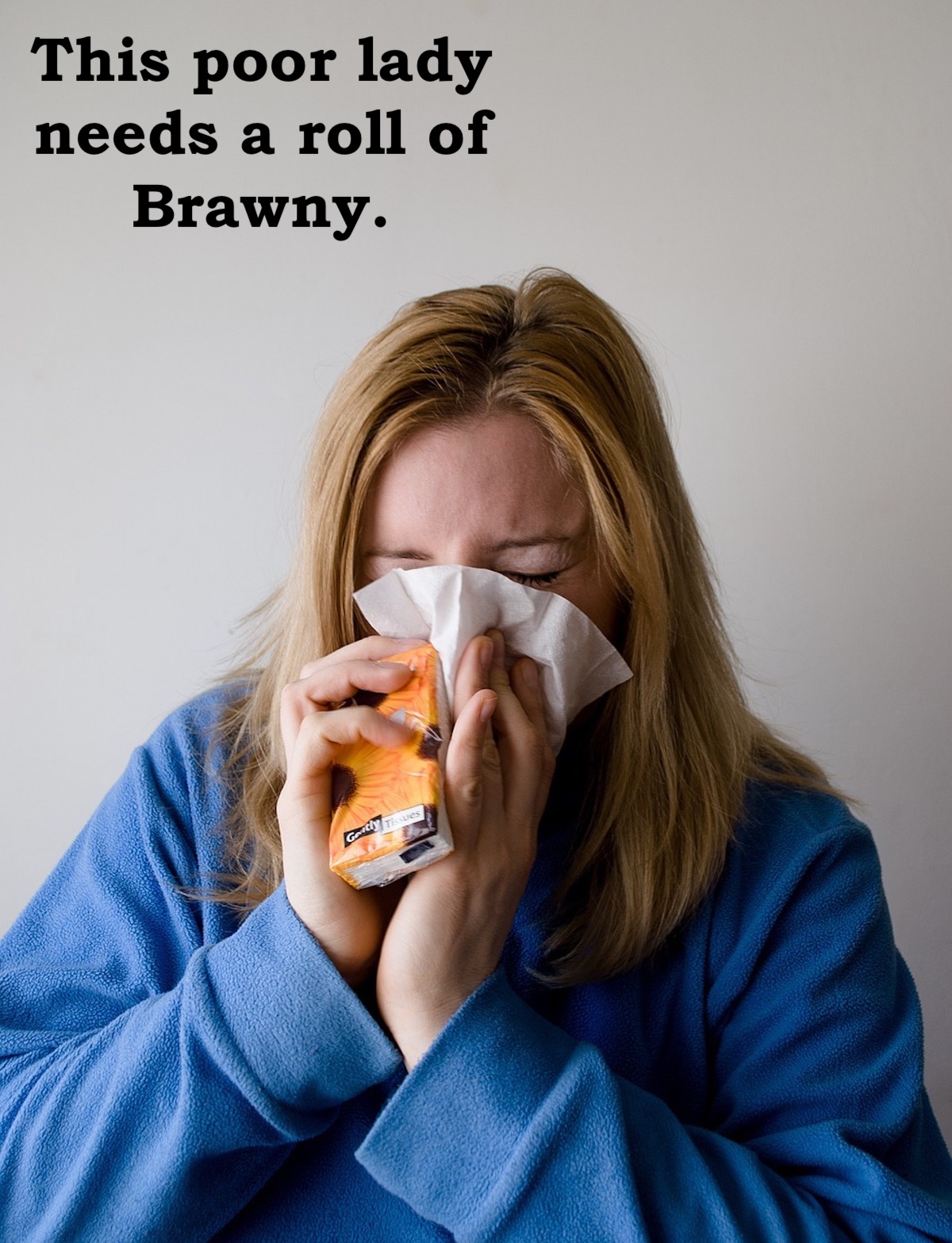 lady blowing her nose